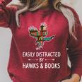 Easily Distracted By Hawks & Books Lover Falcon Bird Raglan Sleeve Sweatshirt Heather Dust