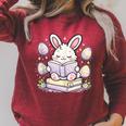 Easter Bunny Reading Book Cute Pastel Eggs Raglan Sleeve Sweatshirt Heather Dust Easter Bunny Reading Book Cute Pastel Eggs Raglan Sleeve Sweatshirt Heather Dust