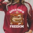 Education Is Freedom History Month Book Black Teacher Raglan Sleeve Sweatshirt Heather Dust Education Is Freedom History Month Book Black Teacher Raglan Sleeve Sweatshirt Heather Dust