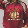 Fall In Love With Learning Books Pumpkin Autum Thanksgiving Raglan Sleeve Sweatshirt Heather Dust