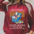 A Girl Who Loves Books Cats And Dogs Cat Book Reading Raglan Sleeve Sweatshirt Heather Dust