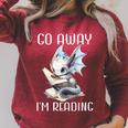 Go Away I'm Reading a Book Dragon Books And Dragons Bookish Premium Tri-Blend Raglan Sleeve Sweatshirt Heather Dust