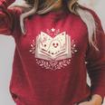 Haunted Library – Glowing Book Raglan Sleeve Sweatshirt Heather Dust
