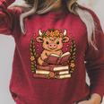 Highland Cow Reading Book Graphic Cow With Book Floral Raglan Sleeve Sweatshirt Heather Dust Highland Cow Reading Book Graphic Cow With Book Floral Raglan Sleeve Sweatshirt Heather Dust