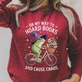 On My Way To Hoard Books And Cause Chaos Frog Raglan Sleeve Sweatshirt Heather Dust