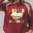 Hooked On Books Retro Reader Raglan Sleeve Sweatshirt Heather Dust Hooked On Books Retro Reader Raglan Sleeve Sweatshirt Heather Dust