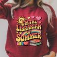 I'm The Librarian Of Summer Groovy Rainbow Retro Book Lover Raglan Sleeve Sweatshirt Heather Dust