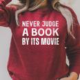 Never Judge A Book By Its Movie Raglan Sleeve Sweatshirt Heather Dust