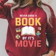 Never Judge A Book By It's Movie Reading Raglan Sleeve Sweatshirt Heather Dust