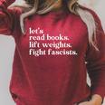 Let's Read Books Lift Weights Fight Fascists Raglan Sleeve Sweatshirt Heather Dust