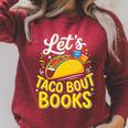 Let's Taco About Books Mexican Pun Bookworm Premium Tri-Blend Raglan Sleeve Sweatshirt Heather Dust