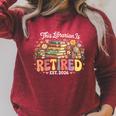This Librarian Is Retired 2026 Book Lover Retirement Reading Premium Tri-Blend Raglan Sleeve Sweatshirt Heather Dust