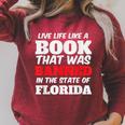 Live Life Like A Book Banned In The State Of Florida Raglan Sleeve Sweatshirt Heather Dust Live Life Like A Book Banned In The State Of Florida Raglan Sleeve Sweatshirt Heather Dust