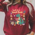 Lost In a Good Book Cute Reading Dinosaur Illustration Raglan Sleeve Sweatshirt Heather Dust