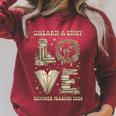 Love Unearth a Story Summer Reading 2026 Dino Skeleton Book Raglan Sleeve Sweatshirt Heather Dust Love Unearth a Story Summer Reading 2026 Dino Skeleton Book Raglan Sleeve Sweatshirt Heather Dust