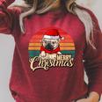 Merry Christmas Retro Vintage Pugmas Pug Reading Books Raglan Sleeve Sweatshirt Heather Dust