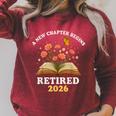 A New Chapter Begins Retired 2026 Floral Book Butterfly Tee Raglan Sleeve Sweatshirt Heather Dust A New Chapter Begins Retired 2026 Floral Book Butterfly Tee Raglan Sleeve Sweatshirt Heather Dust
