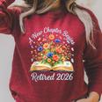 New Chapter Begins Retired 2026 Watercolor Floral Book Women Raglan Sleeve Sweatshirt Heather Dust