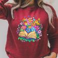 Open Book Surrounded By Colorful Spring Flowers Bloom Raglan Sleeve Sweatshirt Heather Dust