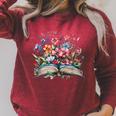 Open Book With Wildflowers Blooming Around Pages Raglan Sleeve Sweatshirt Heather Dust Open Book With Wildflowers Blooming Around Pages Raglan Sleeve Sweatshirt Heather Dust