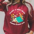 Plant a Seed Read Summer Reading 2026 Butterfly Book Floral Raglan Sleeve Sweatshirt Heather Dust