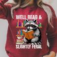 Well Read & Slightly Feral Raccoon Book Lover Graphic Raglan Sleeve Sweatshirt Heather Dust Well Read & Slightly Feral Raccoon Book Lover Graphic Raglan Sleeve Sweatshirt Heather Dust