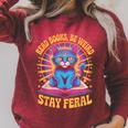 Read Books Be Weird Stay Feral Cat Groovy Raglan Sleeve Sweatshirt Heather Dust Read Books Be Weird Stay Feral Cat Groovy Raglan Sleeve Sweatshirt Heather Dust