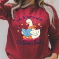 I Still Read Children’s Books Cute Duck Reading Book Lover Raglan Sleeve Sweatshirt Heather Dust