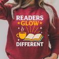 Readers Glow Different Book Lover Reading Premium Tri-Blend Raglan Sleeve Sweatshirt Heather Dust