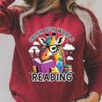 Reading Colors Our World Color Our World 2026 Reading Book Premium Tri-Blend Raglan Sleeve Sweatshirt Heather Dust Reading Colors Our World Color Our World 2026 Reading Book Premium Tri-Blend Raglan Sleeve Sweatshirt Heather Dust