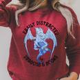 Reading Easily Distracted By Dragons & Books Lover Bookworm Raglan Sleeve Sweatshirt Heather Dust