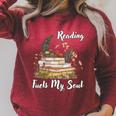 Reading Fuels My Soul Inspirational Book Lover & Bibliophile Premium Tri-Blend Raglan Sleeve Sweatshirt Heather Dust