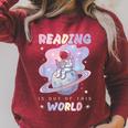 Reading Is Out Of This World Astronaut Space Book Lover Raglan Sleeve Sweatshirt Heather Dust