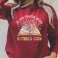 Retired 2026 A New Chapter Begins Floral Book Retirement Raglan Sleeve Sweatshirt Heather Dust