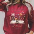 Retired 2026 Teacher Women A New Chapter Begins Floral Book Raglan Sleeve Sweatshirt Heather Dust