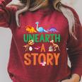 Summer Reading 2026 Dinosaurs Book Lover Unearth A Story Raglan Sleeve Sweatshirt Heather Dust Summer Reading 2026 Dinosaurs Book Lover Unearth A Story Raglan Sleeve Sweatshirt Heather Dust
