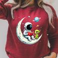 UFO Alien Astronaut Reading Book In Space Raglan Sleeve Sweatshirt Heather Dust UFO Alien Astronaut Reading Book In Space Raglan Sleeve Sweatshirt Heather Dust