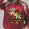 Unearth a Story Dinosaur Reading Book Dino T Rex Summer 2026 Raglan Sleeve Sweatshirt Heather Dust