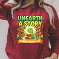 Unearth A Story Dinosaur Summer Reading 2026 Books Raglan Sleeve Sweatshirt Heather Dust