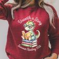 Unearth A Story Summer Reading 2026 Cute Dino Book Lover Raglan Sleeve Sweatshirt Heather Dust Unearth A Story Summer Reading 2026 Cute Dino Book Lover Raglan Sleeve Sweatshirt Heather Dust