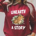 Unearth A Story Summer Reading Program 2026 Capybara Book Raglan Sleeve Sweatshirt Heather Dust