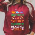 Unearth A Story Summer Reading Program 2026 Dinosaur Book Raglan Sleeve Sweatshirt Heather Dust