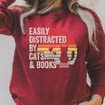 Vintage Retro Easily Distracted By Cats And Books Raglan Sleeve Sweatshirt Heather Dust