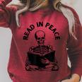 Whimsigoth Skeleton Reading A Book Dark Gothic Aesthetic Raglan Sleeve Sweatshirt Heather Dust
