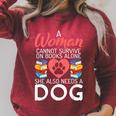 A Woman Cannot Survive On Books Alone She Also Needs a Dog Raglan Sleeve Sweatshirt Heather Dust