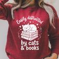 Women's Easily Distracted By Cats And Books Raglan Sleeve Sweatshirt Heather Dust