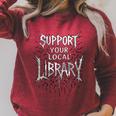 Women's Support Your Local Library Death Metal And Hardcore Book Raglan Sleeve Sweatshirt Heather Dust