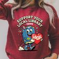 Women's Support Your Local Library Staff Retro Book Mascot Raglan Sleeve Sweatshirt Heather Dust Women's Support Your Local Library Staff Retro Book Mascot Raglan Sleeve Sweatshirt Heather Dust