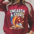 Women's Unearth A Story Rainbow Treasure Book Summer Reading 2026 Raglan Sleeve Sweatshirt Heather Dust Women's Unearth A Story Rainbow Treasure Book Summer Reading 2026 Raglan Sleeve Sweatshirt Heather Dust