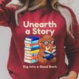 Women's Unearth A Story Reading Mammoth Prehistoric Book Librarian Raglan Sleeve Sweatshirt Heather Dust